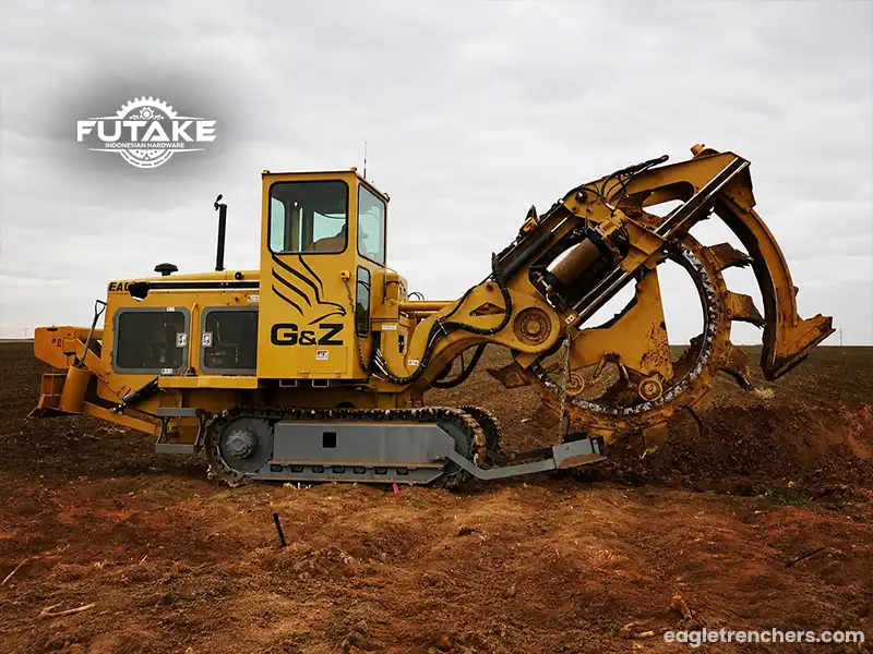 wheel trencher yang menggunakan roda pemotong (cutting wheel) yang berputar